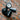 Image of black CAM-600FL-AC floodlight camera facing front;
Image of black CAM-600FL-AC floodlight camera on a brick wall;
Image of black CAM-600FL-AC facing left with labelled features;
Image of black CAM-600FL-AC floodlight camera close up on a brick wall;
Image of CAM-600FL-AC floodlight camera working with Amalock App;