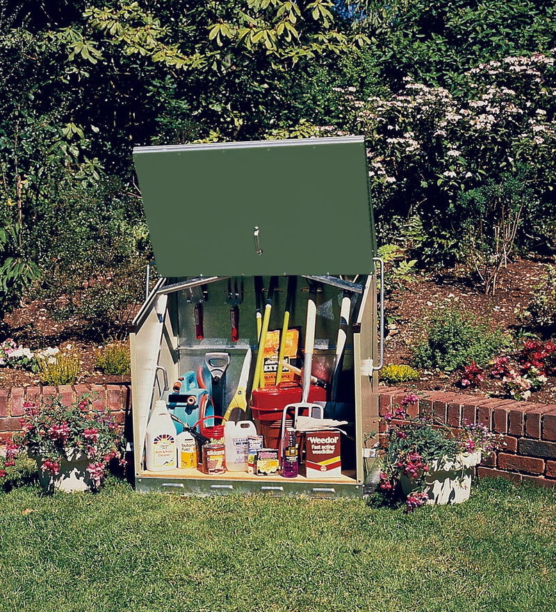 Front view of a two-tone green Trimetals Sentinel compact metal garden storage unit with garden tools stored inside.
